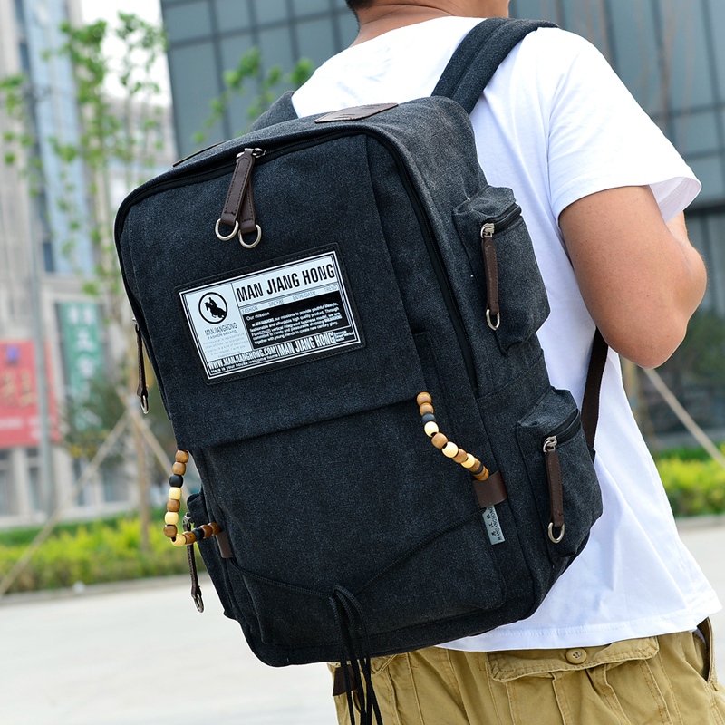 2015新款大容量韩版帆布双肩包男旅行休闲包中学生书包女男士背包